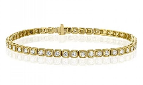 Yellow gold tennis bracelet with plenty of diamonds and a slender silhouette from Simon G.