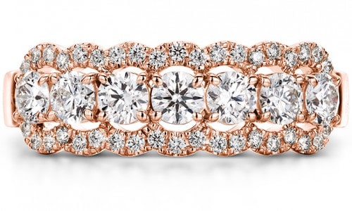 Luxurious fashion ring exhibiting a plethora of diamonds and rose gold by Hearts On Fire