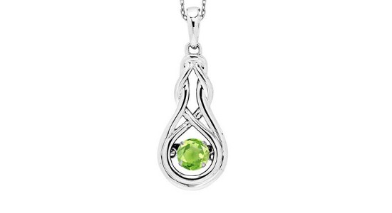 A peridot pendant necklace with a silver setting