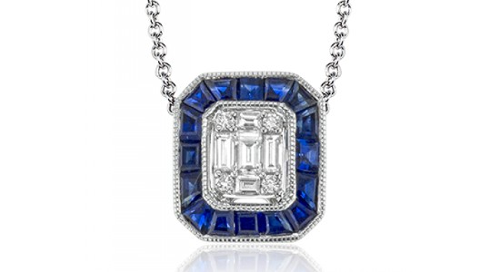 a silver pendant necklace featuring a cluster of diamonds surrounded by a row of sapphires
