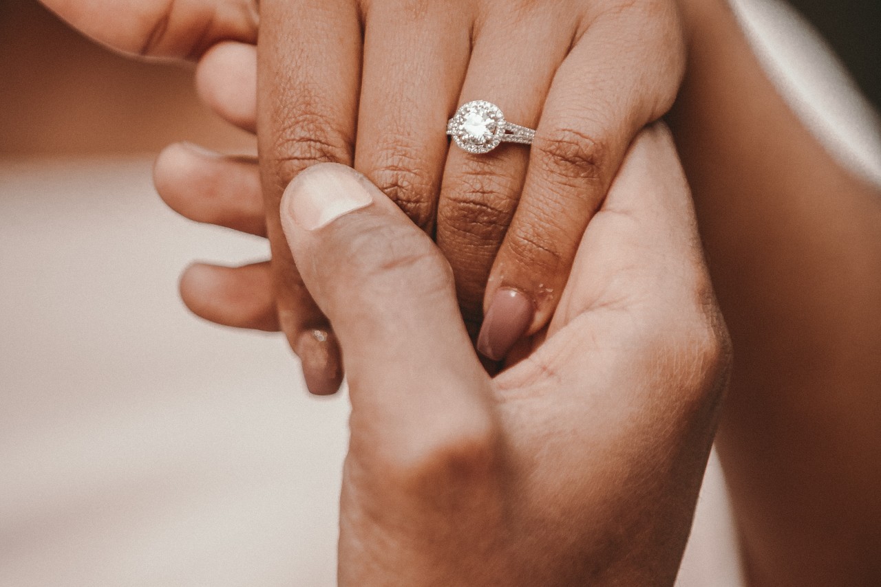 Fashionable lady shows off her radiant diamond ring